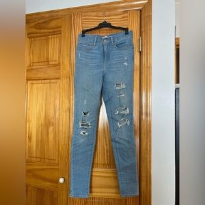 Levi’s high rise super skinny distressed denim